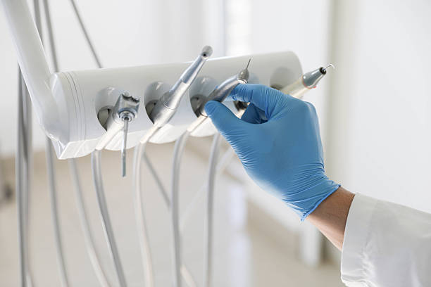 Professional Root Canal Treatment technician working in Slinger, WI